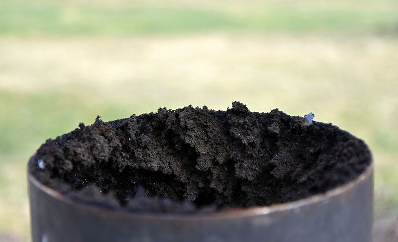Stock photo of creosote build-up - Sweeps and Ladders Close up view of built up creosote in a flue pipe